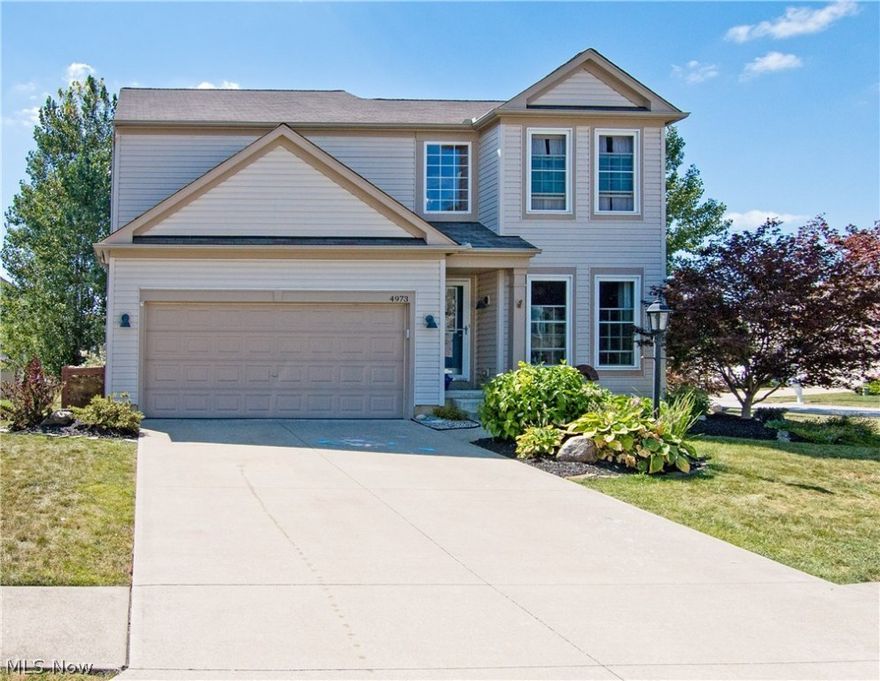 Move-in ready three-bedroom colonial on corner lot, in a very desirable neighborhood.  Beautifully landscaped yard with stone patio, pergola, a small pond and waterfall…providing the perfect setting for grilling out and entertaining!  The kitchen has rich hardwood floors, maple cabinetry, center island, and all stainless steel appliances. The family room boasts vaulted ceilings and fireplace, and the home is tastefully decorated top to bottom.  Second floor includes a Master Suite with walk-in closet and private master bathroom. Plus two additional bedrooms and a 2nd full bath.  Wanting a hideaway place, or place to entertain?  The basement features a 560 SF Finished Rec Room with custom-built bar, a 3rd full bathroom, and two storage rooms. Retractable garage screen door, backyard outlet and WOW internet service. Updates include Universal Windows (2014) with 30-Yr. Transferable Warranty, SS Range (2014), Washer/Dryer (2015), basement full bath (2015). Great location, close to I71, and