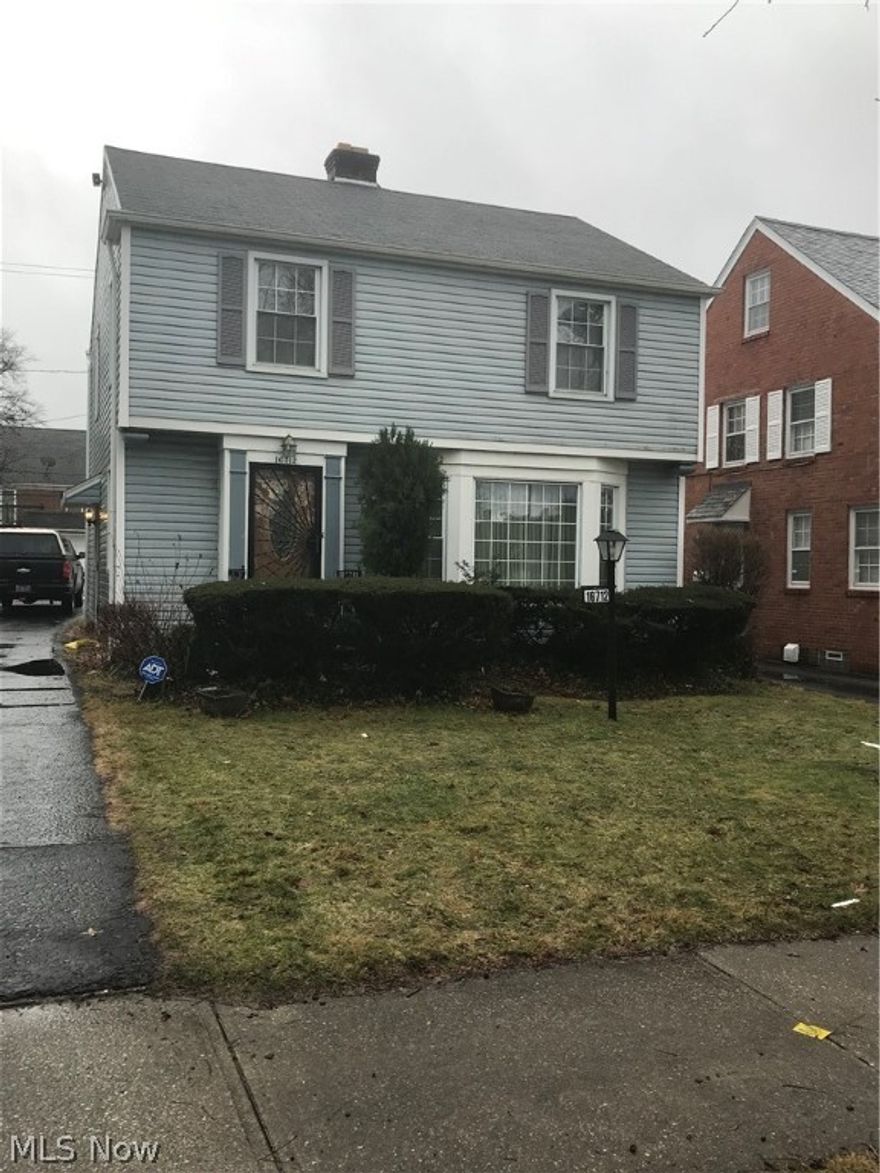 Home is vinyl sided all windows replaced and glass block windows basement.  Up dated doors for front  and bedroom. Kitchen updated with new counter top and tiled walls behind stove.  Dish washer waiting on new door panel cover. Family room has 12x11 with its own heat.  Floors are carpeted with beautiful hard wood floors underneath. Walk in shower. Dinning room chandelier does not stay and will be replaced.