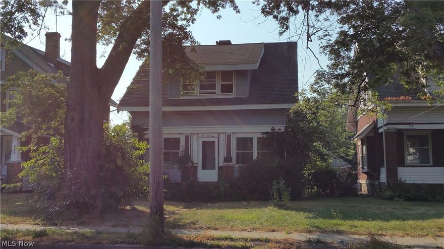 All of the charms of a home built in the 1920s: hardwood flooring, thick baseboards, fireplace, and an enclosed porch. Does it need work? Yes, but all of the effort could create a gorgeously restored home! This is a Fannie Mae Homepath property. Property now under auction terms.
