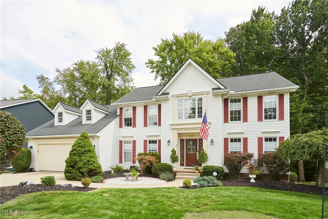 Nestled in the desirable Highland Chase development, this custom, one-owner Boggs-built Colonial features 4 spacious bedrooms, 3.5 baths, and 2,430 sq. ft. of above-grade living space, plus an additional 1,000 sq. ft. in the fully finished lower level. Step inside to a thoughtfully designed layout that’s perfect for both gatherings and everyday living. The main level showcases a formal dining room accented with wainscoting, crown molding, and new luxury vinyl flooring. Across the foyer, the formal living room opens through French doors into the inviting family room, highlighted by a cozy gas fireplace. The family room flows seamlessly into the eat-in kitchen, which features a walk-in pantry, Corian countertops, stainless steel appliances, and ample storage. A sunlit dining area provides access to the multi-level back deck and stamped concrete patio, overlooking a private backyard that backs up to woods and bike trails. Just steps away, you’ll find a convenient half bath, main-level laundry room, access to the 2-car attached garage, and a bright home office with skylights and direct access to the back deck. Upstairs, the spacious primary suite features vaulted ceilings and an en-suite bath, complete with a dual vanity, soaking tub, and stand-alone shower. Three additional bedrooms and a full bath—updated with new granite countertops and fresh flooring—complete the second level. The finished walk-out LL includes a large rec room with a second gas fireplace, a full bath, a storage/utility room, and access to the back patio. Updates include: Newer roof with transferable warranty for 50 years(2018), brand new carpet and luxury vinyl flooring (2025), New HVAC system with 10-year parts/labor warranty (Aug. 2025), and HWT with 6-year parts warranty (Aug. 2025). Don’t miss the opportunity to make this beautifully maintained, move-in-ready home your own—ideally located near shopping, dining, and entertainment.