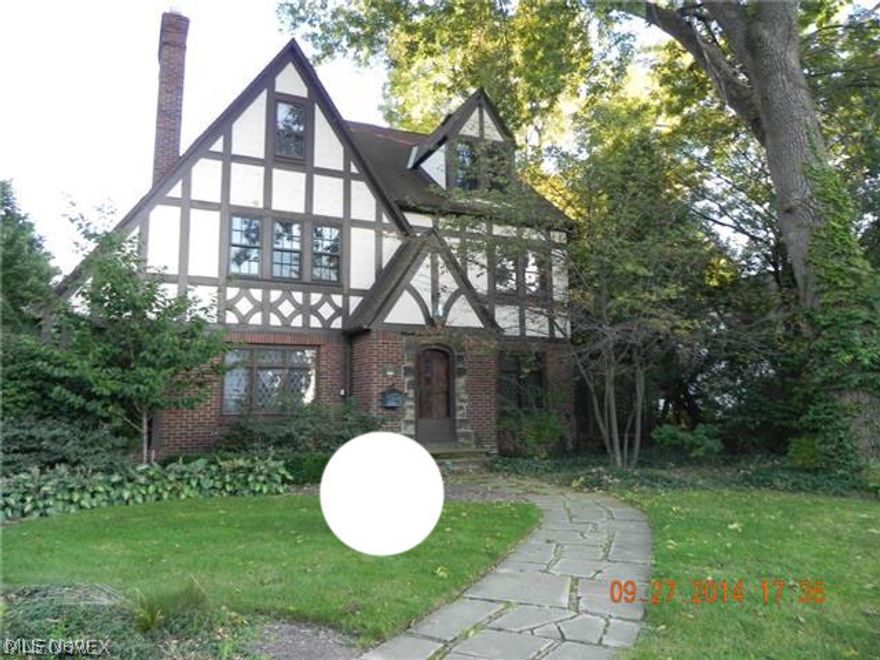 Do you love homes rich in character and close to many public and private amenities? If yes, look no further this Tudor style home offers just that old world charm with some of today’s modern charm.   The kitchen has been updated with cherry cabinets and bay window, glamour bathroom with jacuzzi tub, living room and master bedroom working fireplaces.   This is a must see property!    This is a Fannie Mae Home Path Property. Buyer to assume any/all point of sale violations.