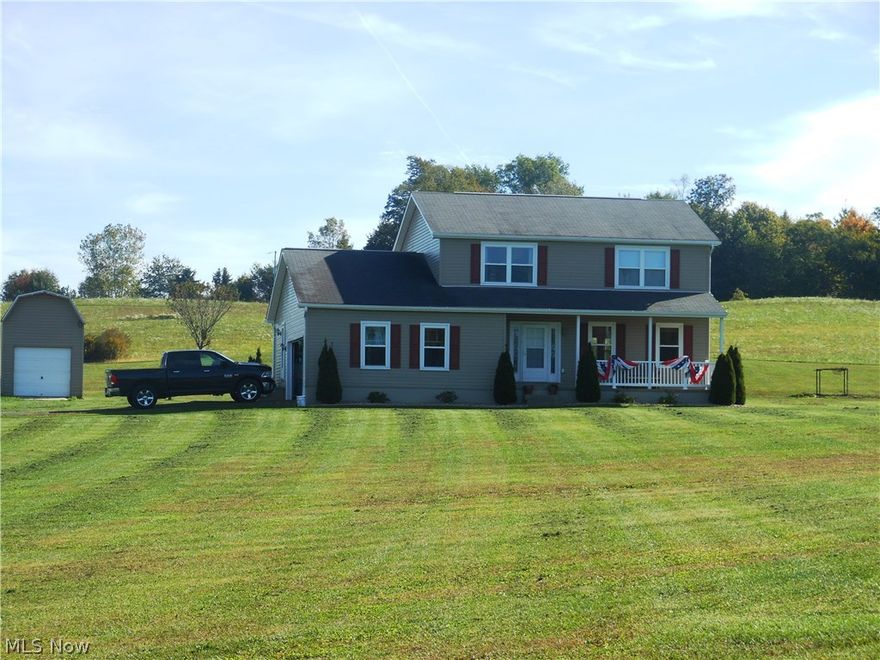 Awesome 5.35 acre parcel with a great home built in 1997. You could not duplicate this home on 5+ acres today, with the current building costs, for this price! New siding and windows installed in 2012. 2488 sq ft including the finished lower level. 3 nice sized bedrooms and 2 full baths on the 2nd floor. The master bedroom is huge and includes a full bath and a big walk in closet. The family room is 28 x 15 and has a beautiful window seat. The kitchen and dining area are combined for easy entertaining. Plenty of cabinets and all the appliances are included in the kitchen. 1st floor laundry and the washer and dryer are included. The no maintenance deck is great for taking in all the views this property has to offer. One year Home Warranty included.