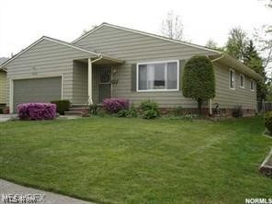 Don't miss this incredible opportunity within the Maple Heights area. This wonderful 3 Bedroom and 1.5-bathroom ranch has a spacious Living and Dining room area. Newer carpet in LR and DR. Kitchen has newer ceramic flooring and cabinets. Nice finished rec room in basement, attached 2-car garage, security system and a large fenced in backyard. Property sold as is.