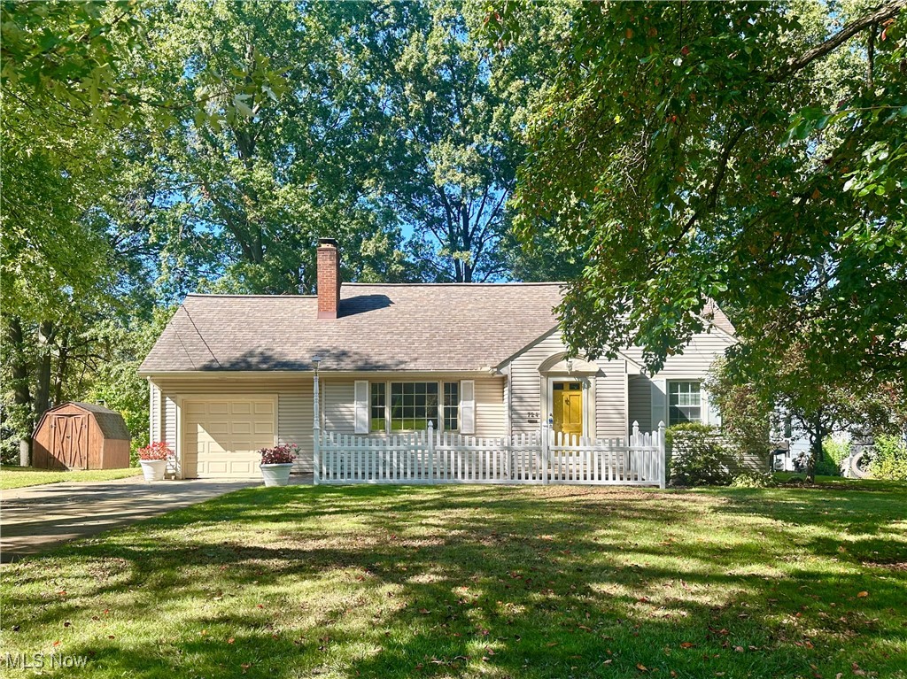 Step into the charm of this delightful Cape Cod home, where a classic white picket fence and a sunny yellow front door welcome you with open arms. The main level boasts a spacious living room featuring a cozy fireplace, perfect for those chilly evenings. Enjoy Sunday dinner in the dining room with built-in cabinetry or unwind in the inviting family room. The heart of the home is undoubtedly the large updated kitchen, complete with quartz countertops, sleek stainless steel appliances, and ample cupboard space for all your culinary needs. A dining area makes it easy to enjoy casual meals with loved ones. Two comfortable bedrooms and a full bath round out the first floor, providing a perfect blend of functionality and comfort. Venture upstairs to discover an expansive area that offers endless possibilities—transform it into a bedroom, playroom, office, or den to suit your lifestyle. This level also features a convenient half-bath and generous closet/storage space, ensuring you have room for everything. Additional highlights include a full basement with a laundry area, an attached one-car garage for easy access, and stamped concrete patios in both the front and back, ideal for relaxing and outdoor entertaining. The serene backyard, adorned with large shade trees, offers a private oasis for leisure and play. Best of all, this home is situated in a desirable Niles neighborhood not far from Stevens Park, schools, shopping, dining and major routes. Don't wait! This one won't last long!