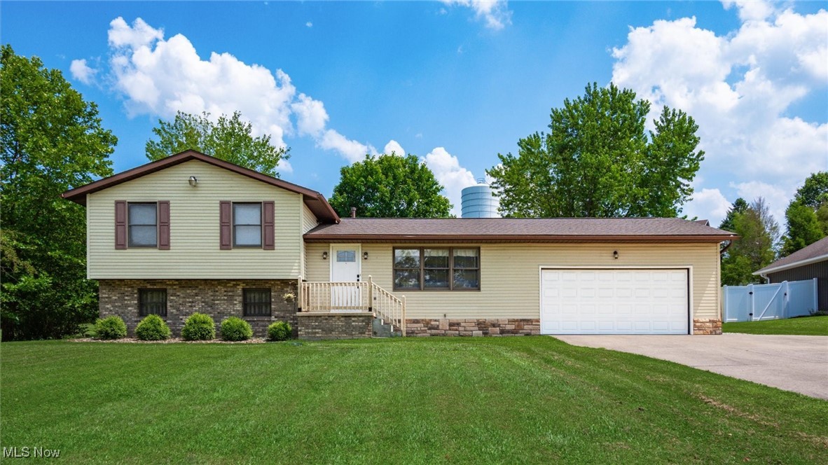 Tucked just minutes from a State Park & sparkling lake, this stunning multi-level home is the perfect blend of nature and comfort. Set on nearly half an acre, the property offers plenty of room to relax, entertain, and explore. With 4 spacious bedrooms and 3 full baths, there is room for everyone to spread out and feel at home. Inside you'll find an updated kitchen with newer appliances, modern finishes, ideal for cooking up memories. The layout flows effortlessly through a formal living room, a cozy family room, and an impressive great room that brings in an abundance of natural light. Step out onto the deck for peaceful morning coffee or sunset dinners under the open sky. A 2 car garage provides convenience, while the lush yard offers a slice of outdoor serenity. Whether you are drawn to the nearby park trails, activities, or the inviting interior this home is a gem in a prime location, Ready for your next adventure? This is the place to start!