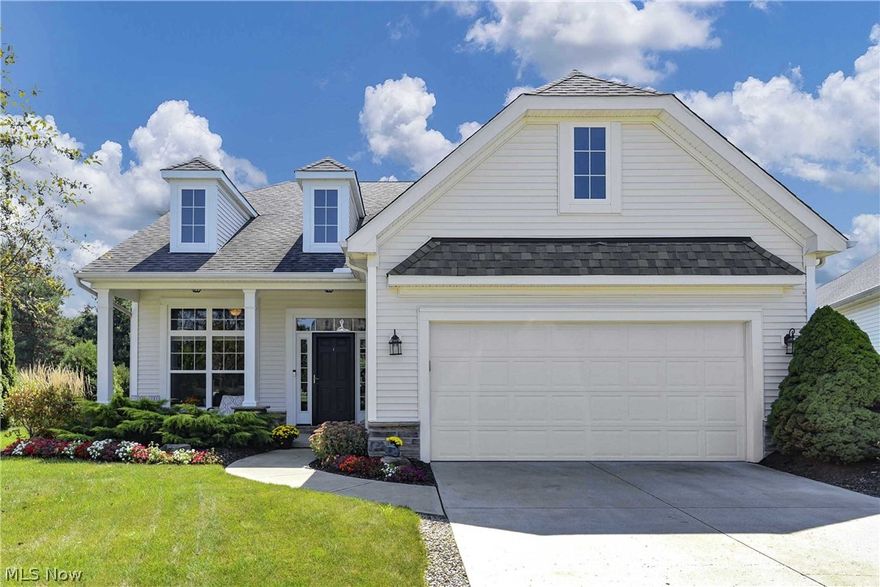 Prepare to be Moved!...by this exceptionally charming Cape Cod --spacious, well-maintained & tastefully decorated in one of the most sought-after neighborhoods in Avon Lake! The perfect blend of classic comfort & welcoming touches topped with the most desirable updates & stylish decor. The welcoming front porch leads you into the tiled foyer to the charming living room/office.  The 2-story family room and dining room have newer hardwood floors and feature walls of windows.  A terrific open concept plan, this space is perfect for entertaining! Sliding doors lead to the private back yard and patio. The eat-in kitchen combines rich-toned granite with loads of cabinetry, brand new gleaming SS appliances, center island plus a breakfast bar. A convenient half-bath is just steps away from the kitchen. First floor mudroom/laundry room combines utility & space. The 1st floor Master features an en-suite bath with dual sink vanity and shower plus walk-in closet. The second level boasts two genero