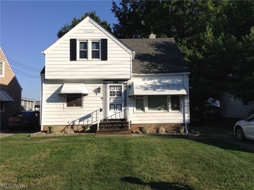 Spacious Cape Cod-Colonial 3Bdrms 1 full bath. Many updates include roof on home & garage, vinyl windows 2011, glass block windows 2010, furnace & H2O 2006, All rooms have hardwood floors. Eat in kitchen with formal dining room, and sun room full basement partially finished. Breaker box updated in 1993. Full Bath in immediate need of updating signs of mold & mildew.