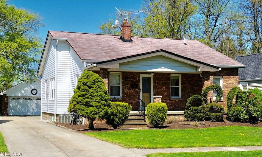 Welcome to this old world charm Mayfield Heights Ranch that is perfect for a car enthusiast, landscaper, or anyone who wants a 4 car garage! This home has complete 1 floor living as well! 3 bedroom (1 bedroom has been converted into a first floor laundry and can easily be converted back), 2 full bathrooms, natural wood trim, and hardwood floors in all bedrooms. Very nice rare front porch plus rear yard that features 2 patios. Basement features a HUGE full kitchen, bar, bathroom, rec room; plenty of space for large family get together's. Well maintained deep yard. New Windows. 1 year home warranty is offered as well!