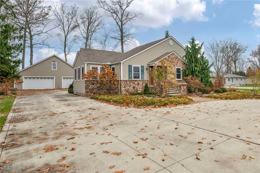 Welcome to 12150 N Boone Rd in Columbia Station. This beautifully remodeled 4 bedroom, 2.5 bath home offers over 2500 square feet of comfortable living space on a lovely landscaped lot with an irrigated front lawn and a spacious wraparound driveway. The property features a fully finished outbuilding that includes a heated oversized garage, insulated steel walls, a half bath, and plumbing upstairs. It is an exceptional space for a studio, guest accommodations, or a workshop. Inside the home, you will find a warm and inviting layout with oak cabinetry, real wood finishes, and a generous living area centered around a striking fireplace. The eat-in kitchen opens to the deck and patio, providing a seamless indoor to outdoor flow that is perfect for everyday living and entertaining. The main level includes laundry and high quality appliances that remain with the home. The primary suite offers skylights, a spa inspired bathroom with granite countertops, and an expansive walk in closet. The upper level provides additional living space that can serve as a bedroom, office, media room, or play area. Additional highlights include a three car garage, custom drapery, and numerous improvements throughout. Located in the Columbia Local School District with no HOA. This property provides the space, flexibility, and convenience that many buyers are looking for today.