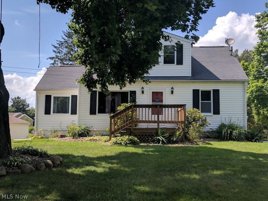 Here is an excellent opportunity to live in Tallmadge!  Welcome to 1611 Northeast Ave in Tallmadge, a wonderful Cape Cod that sits on over a half an acre.  This well maintained home offers 3 bedroom including a spacious 2nd floor master suite and 2 full baths with an additional shower in the basement.  This home has been freshly painted throughout and has a large living room, a family room with a vaulted ceiling, and a fully applianced galley style kitchen. The new home owner will love all the outdoors has to offer.  A 2 car garage with an additional covered area perfect for a boat or trailer.  Kids will love all of the yard to play in. There is a great concrete driveway with plenty of room for parking and turning around.  And there is also a nice sized deck for entertaining.  Located close to Kent State, shopping, schools, and just down the street from the Metro bike and hike trail.  Stop and see all this charming cape has to offer.