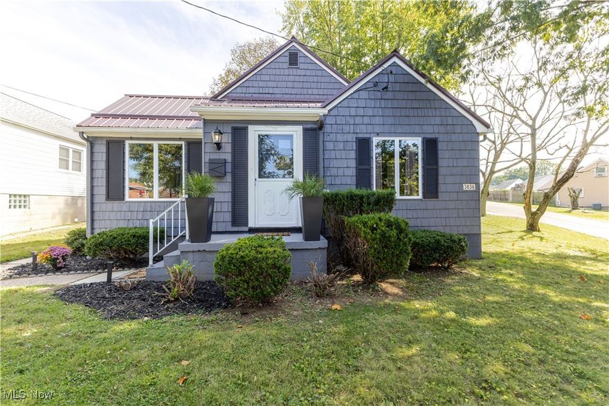 Don't miss this beautifully remodeled home on a spacious corner lot in the Marland Heights neighborhood! This home offers 3 bedrooms, 2 on the main level including a primary suite with its own bath and convenient laundry tucked into a closet (washer & dryer included!). Upstairs you'll find a nice sized bedroom with an oversized walk-through space perfect as a sitting room, playroom, or office. The bright and welcoming living room flows seamlessly into the dining area, while the updated kitchen boasts quartz countertops and stainless-steel appliances. All furniture is negotiable. The full basement provides excellent storage space. Step outside to enjoy the backyard and patio-ideal for entertaining or relaxing. The outdoor fireplace adds cozy ambiance for cool fall evenings, roasting marshmallows, or gathering with friends. The large corner lot is surrounded by beautiful trees, and the rear parking pad keeps vehicles off the street. Move-in ready and waiting for you!