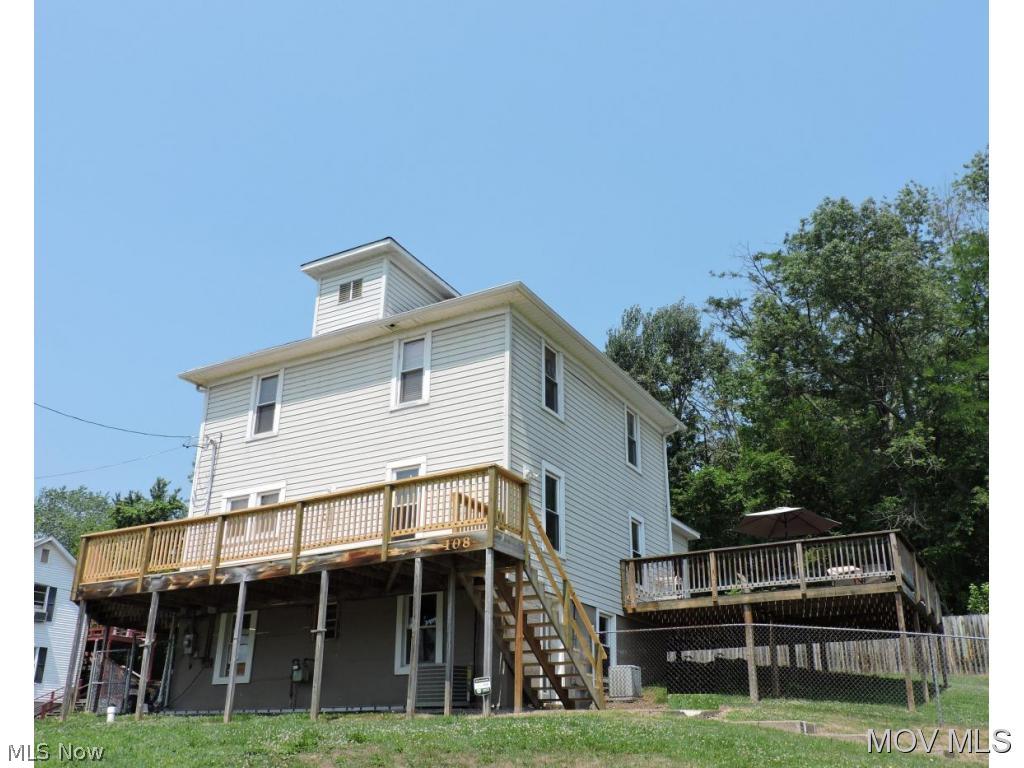 Well maintained & updated home. Ohio River view. Foyer w/guest closet & natural wood work. Spacious living room w/French doors & beautiful fireplace w/mantel. Light & airy dining room w/Bamboo flooring & great space for a large hutch. Kitchen w/Maple cabinetry, Corian counter tops & door to large deck w/river view. 3 seasons room for relaxing or would make a nice home office w/5 sliding doors. Grand sized full bath w/corner shower & garden tub. Walk up attic for storage. 3 large exterior decks for relaxing or entertaining, fenced yard, off street parking & space to build a garage Elem: Harmar Elementary School Elem/Bus: Y JrHigh: Marietta Middle School School JrHigh/Bus: Y High: Marietta High School High/Bus: Y Fire: CIT Police: CTY ;SQFT=Fin L1:676, Fin L2:676, Fin Bsmt:338, Fin Above:1352, Fin Total:1690, Unfin Bsmt:338, Unfin Above:338;GAR= Gar Other-See Remarks;PRKG= Off Street