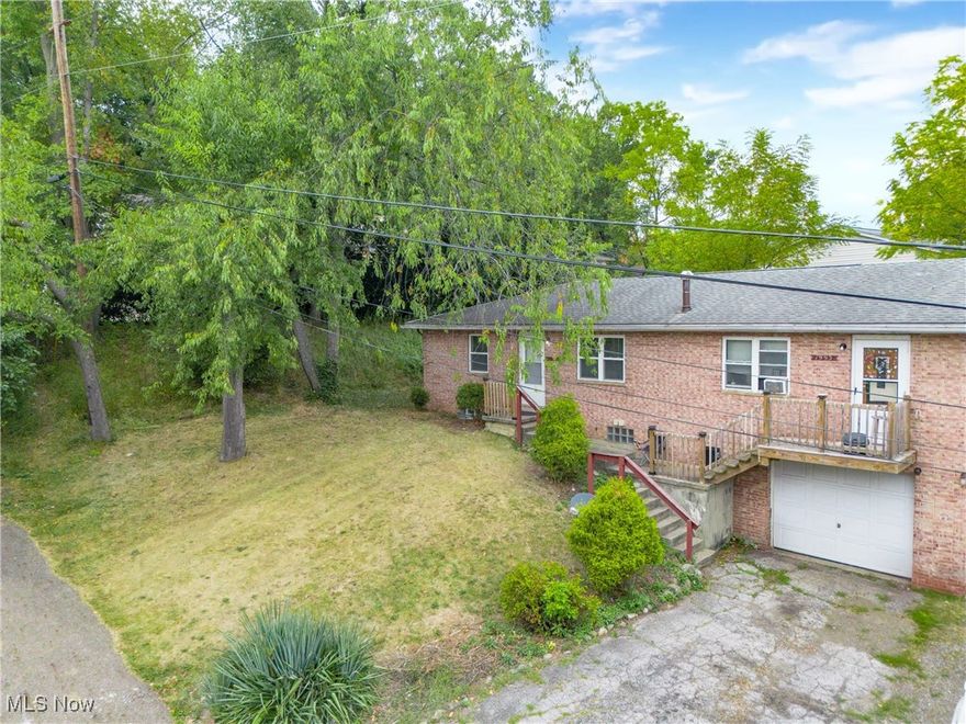 Well maintained Ellet duplex! Turnkey rental property with immediate guarantee cash flow. Both units have Section 8 tenants in place. The property is located on a quiet dead-end street. Each unit is a 2 bedroom, 1 bath, and 1-car attached garage. The central stairway leads to the downstairs garage/basement with massive storage space, and laundry area. 

Both electric and gas hookups available and virtually brand-new furnaces. The 2-car garage has a central divider separating each side. Property tours available upon offer.
Hardwood Floors (2025)

Bathroom Inserts (2025)

Front and Rear Deck/Steps (2024)

Electric Service (2021)

Furnaces (2021 & 2022)

Hot Water Tanks (2017 & 2018)

Windows (2017)

Electric Panels (2016)

Overhead Garage Doors (2015)