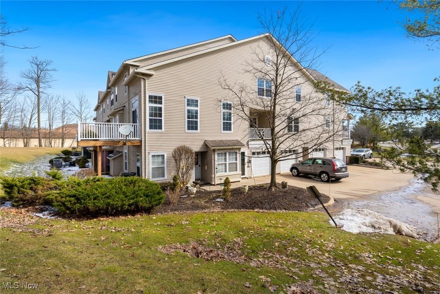 Welcome home! This gorgeous, move-in-ready townhome pairs modern style with everyday comfort in a quiet residential community, just minutes from shopping, dining, parks, and nature preserves. Step inside to a bright, open main level filled with natural light and finished with fresh paint throughout, updated lighting, and stylish fixtures. The spacious living and dining area flows into the beautifully updated kitchen featuring two-tone cabinetry in crisp white and gray, new granite countertops, a classic subway tile backsplash, and stainless-steel appliances. A large sliding glass door opens to a private balcony perfect for morning coffee or winding down in the evening. A convenient half bath completes the main floor. Upstairs, you'll find a vaulted-ceiling primary suite with a private full bath, a large second bedroom, an additional full bath, and a second-floor laundry area with washer and dryer. Both upstairs bathrooms have been updated with new vanities, refreshed fixtures, and new bathroom flooring. Additional updates include a new A/C (2022). Don't miss this one schedule your showing today!