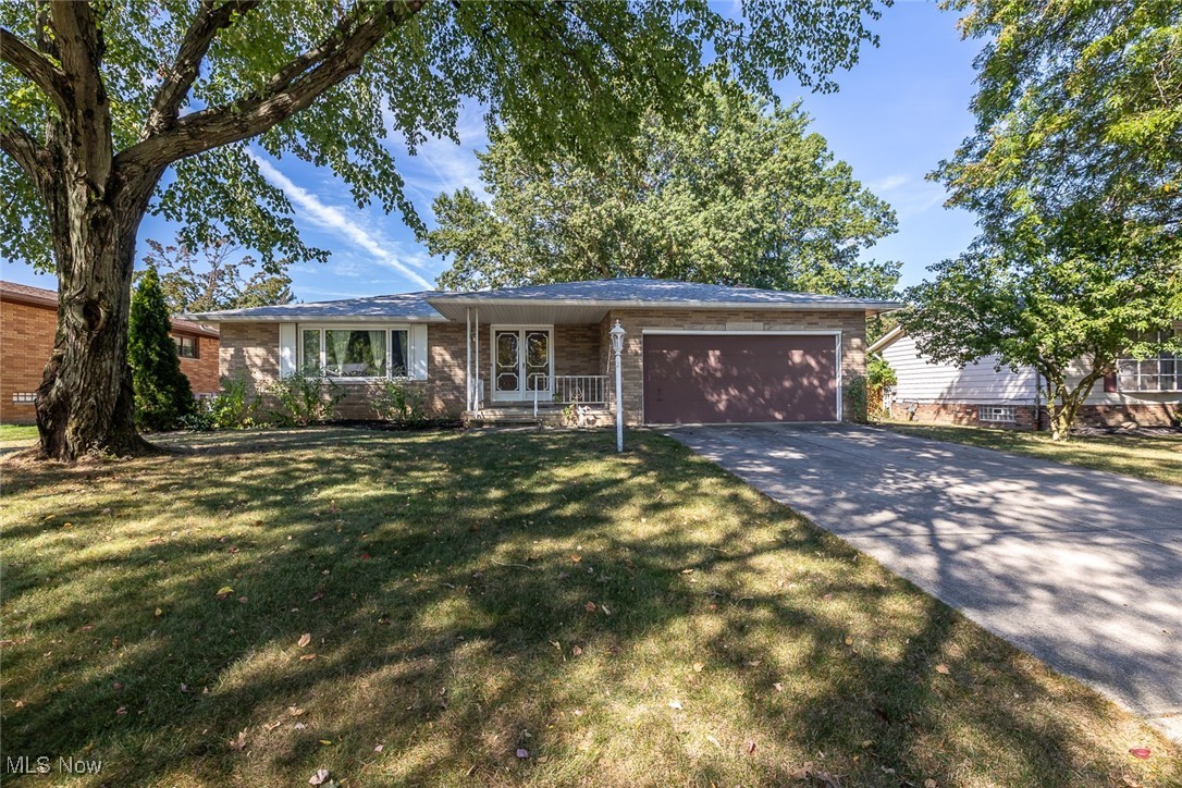 Welcome to this 3 Bedroom, 1 Full bath, 1 Half Bath, All Brick Ranch home, tucked away on a private street yet close to shopping, dining, and easy highway access. Inside, you’ll find a spacious living area, a fully functional kitchen with appliances that stay (including washer, dryer, refrigerator, stove, dishwasher, dehumidifier). A bright outdoor carpeted sunroom overlooking the fenced backyard! Perfect for relaxing or entertaining. The attached 2 car garage with door opener, water spigot and drain, offers extra storage and convenience. Large unfinished basement, ready for your final touches, features shelving and a work bench. While the home is ready for cosmetic updates, it has great bones and potential for you to make it your own. A wonderful opportunity for first-time buyers or families who want to personalize their own space in a great location! Waterproofed Basement, Roof 2024, HVAC gas 2021, Stanek Windows 2012, Hot Water Tank 2021. Call for a private showing today!!!