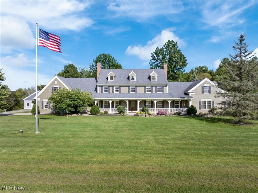 Welcome to a truly exceptional estate nestled on nearly 11 acres in the heart of Wadsworth Township. This stately Cape Cod offers over 6,400 square feet of meticulously maintained and thoughtfully updated living space, featuring 4-5 bedrooms, 3 full baths, 2 half baths and a 1st floor guest/in-law suite! The home's design and finishes blend timeless craftsmanship with modern luxury. The home features rich natural woodwork, beamed ceilings, and three elegant fireplaces.The main level boasts a spacious primary suite with a stunning ensuite bath and walk-in closet. Upstairs, a second primary suite offers additional flexibility—ideal for multigenerational living or as a private guest/in-law suite. Additional bedrooms with walk-in closets, a guest bath, and a vaulted bonus room complete the upper level. The gourmet kitchen is a chef’s dream, offering granite countertops, custom cabinetry, a large island, breakfast bar, and built-in features—all seamlessly connected to formal and informal living areas perfect for entertaining. The walk-out lower level includes a massive recreation room with a full bar, built-ins, and fireplace, ideal for gatherings. Step outside to enjoy your private oasis featuring a heated saltwater in-ground pool, complete with diving board, surrounded by lush landscaping, a stocked pond, and scenic views of mature trees and open pasture. This horse-friendly gentleman's farm includes a 60x36 bank barn with plenty of storage for your "toys", a 15' wide x 10' tall overhead door & 5 horse stalls. Located within the Wadsworth City School District and just minutes from shopping, restaurants and easy highway access, this remarkable property offers peaceful country living with all the conveniences nearby. Don’t miss your chance to own this rare retreat that combines luxury, privacy, and natural beauty in one extraordinary package!