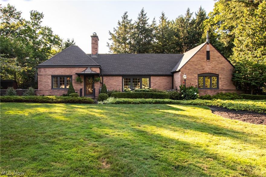 As you turn into the driveway at 10407 Fitzwater Road, you realize this is a truly special home. A one of a kind all-brick ranch, designed by Anthony Nosek, which has been meticulously maintained and updated while preserving the 1940s charm. As you walk to the front door, take in the lovely, professional landscaping. Upon entering, look to the right and you will see a spacious, light-filled living room with a 10 foot barn-style ceiling, fireplace, beautiful hardwood floor and built-in shelving. To the lef of the living room is the dining room, with chandelier and built-in china cabinet. The dining room flows into a large updated kitchen that boasts an island, breakfast bar, granite countertops, Kraftmaid cabinets and stainless-steel appliances. This is truly the heart of the home and great for all your entertaining. The kitchen opens to the family room, paneled in cherry wood and includes a heated floor! The oversized bedrooms, each with its own bath and large closets, are tucked off t