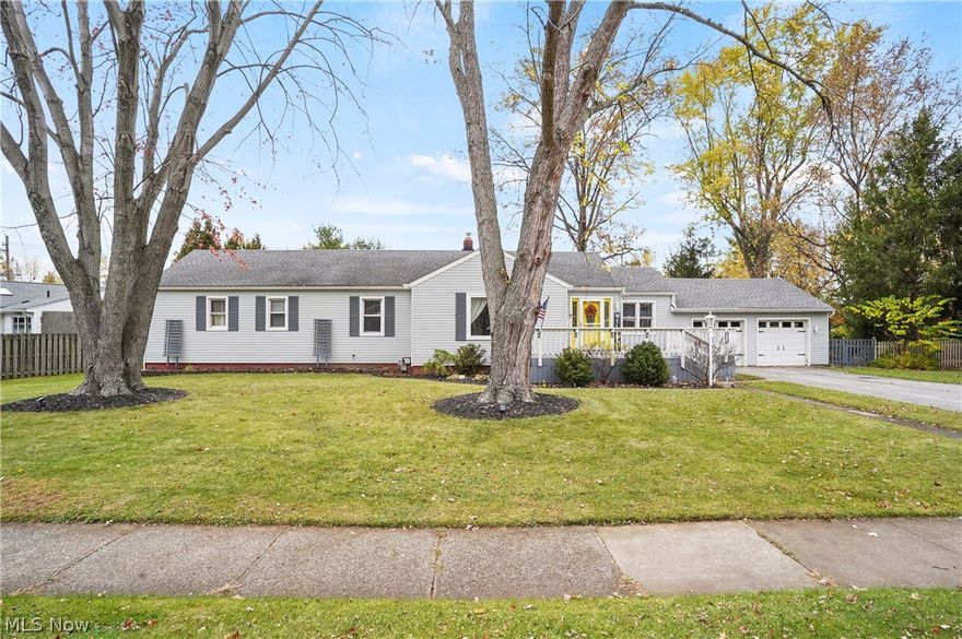 Spacious Ranch home in Willoughby close to Downtown Willoughby offers many features. Oversized Eat in Kitchen with Breakfast Bar, large Island, SS appliances, recessed lighting, ceramic flooring, backsplash, tons of counter space and white cabinetry with crown molding is open to the Dining Room with extra space to make a family room or sitting area. Ceramic flooring in the Foyer opens to the Living Room with Hardwood floors, ornate fireplace mantel accent, big picture window letting in natural light and a cute bump out currently set up for a dog oasis that can make a great space for a desk set up too. Spoil yourself with the Primary Bedroom en-suite featuring Hardwood flooring that continues into the walk in closet, Private Full bathroom with oversized Tiled shower, ceramic tiled flooring and large vanity. Three additional bedrooms all have Hardwood flooring and nice closet spaces close to the second Full bathroom. Plus a bonus half bathroom with lots of storage spaces and first floor laundry including washer and dryer. This could be removed to add a tub or shower too. Head downstairs for a second laundry set up, sump pump, B-Dry waterproofing system with warranty, a mass amount of storage options with shelving and options to finish off areas for more living spaces. Don't miss the bonus craft room with locking door, cabinets, counter spaces and peg walls.  The outside has so much to offer too. From the huge sunroom with two sets of sliding doors to a large front deck, back deck with flower boxes and big fenced yard with firepit area and shed. This yard offers amazing outdoor space. Attached 2 car garage with opener, vinyl siding, and Central air. All of this sits on a triple lot in a wonderful location close to shopping, hospitals, city pool and parks.