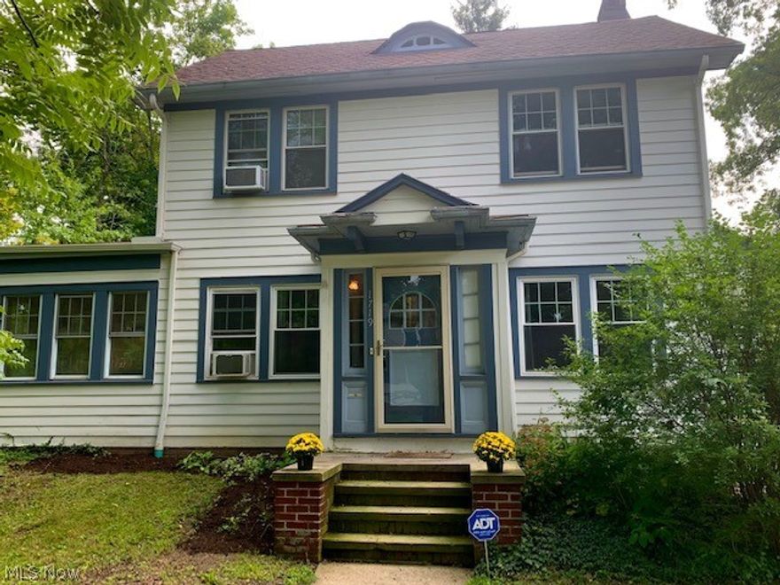This classic Heights center hall colonial is gorgeously updated and waiting for you! Enter thru the front door and instantly appreciate the care this home has been given.  Main floor is so inviting and bright with beautiful light hardwood floors in all rooms, except the kitchen.  Spend upcoming fall and winter nights in this cozy living room enjoying your woodturning fireplace enveloped by beautiful lead glass door built ins.  4 season sun room with tons of new windows and loads of natural light make for a fantastic play area, den or reading nook.  Dining room can be closed off from the rest of the main floor with original wood french doors and more leaded glass built ins!    Modernized kitchen is tastefully crafted with on-trend colors, gas stove and stainless steel appliances with no lack of cabinet storage.  Newly updated 1/2 bath  is just off the kitchen. The 2nd floor offers more gorgeously maintained hardwood floors plus the perfect blend of new convenient features mixed with hin