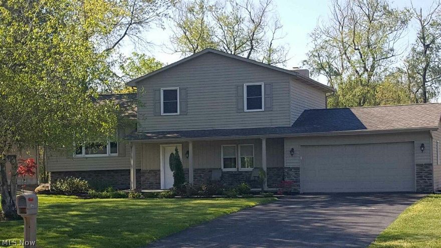 This home has been practically rebuilt from foundation up.  Updates include all new kitchen with hardwood cabinets with dove tailed drawers and granite counter tops with a new modern wood laminate flooring. All interior trim and doors have been replaced and the whole house freshly painted.  The bathrooms have both been updated with new tub/showers and ceramic floors.  All mechanicals have been replaced in the last few years including new central air.  Exterior of home has new windows, roof doors and driveway. This house has almost been rebuilt from the foundation up.