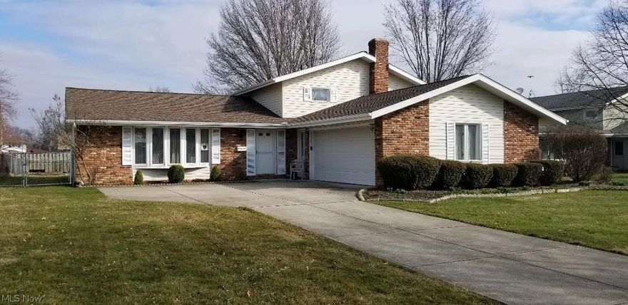 Move right into this lovingly maintained home with many updates. Enter through the open foyer and see the classic curved stairs that leads up the second floor that has 3 good size bedrooms with large closets and a full bath. There is also a large crawl space on this floor for extra storage. The first floor has a large living room with vaulted ceilings & a large picture window, dining room with door to the patio in the back yard, and an eat in kitchen with ceramic floor & plenty of cupboard space. Step down into a cozy sunken family room that has a wood burning fireplace with heater insert. Off the family room is a large laundry area with a summer kitchen and another full bath. Walk right out into the attached 2 car garage. There is a beautiful 3 season room off the family room with ceramic tile floor, Anderson windows, and skylights. Updates include Anderson windows, roof 2016, Furnace and AC 2013, hot water tank 2017. The back yard is fenced and has a storage shed and cement patio.