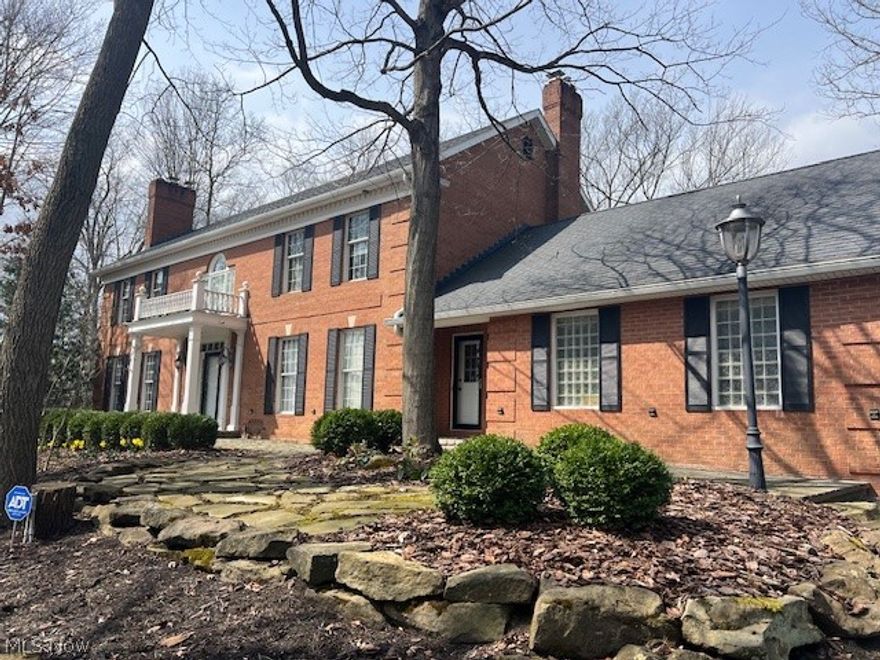 Welcome to 3744 Reserve Drive in Medina, Ohio. This all-brick colonial is perched above Lake Medina and offers beautiful park views. Featuring 4 bedrooms, 2.5 baths, and a 3-car attached garage, this home combines space, charm, and functionality. Many rooms showcase hardwood floors, and the back deck provides the perfect spot to relax and take in the lake views. A convenient foyer elevator makes it easy to move items upstairs. The spacious primary suite includes a walk-in closet and a Jacuzzi bath. Come see all this home has to offer today.
