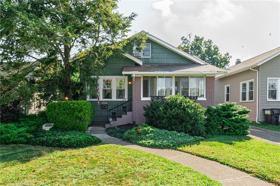 Be the first to experience this stunning bungalow, boasting a spacious finished attic. Choose from a large first-floor master suite or a full upstairs master retreat, complete with a separate sitting room. This traditional floor plan facilitates effortless conversation, flowing seamlessly from room to room. The bathroom has been recently remodeled within the last decade, featuring a brand new tub installed within the last three years. Enjoy your morning coffee in the heated sunroom or on the enclosed front porch. The backyard offers endless tranquility, enhancing the property's serenity. Hot water/ steamer system regularly serviced.