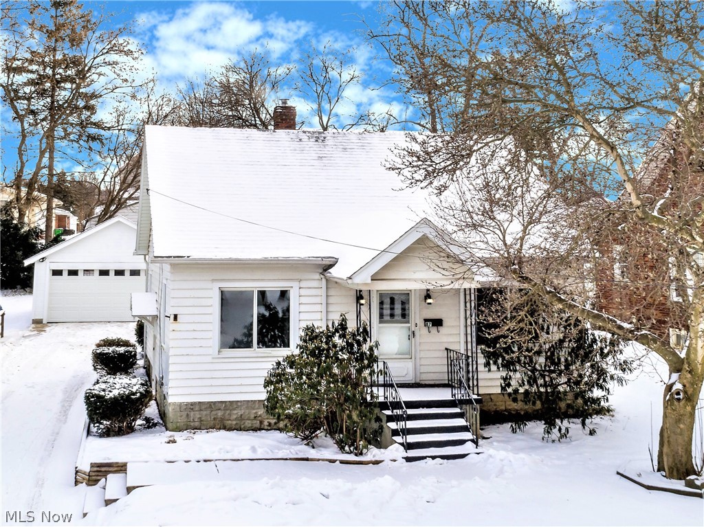** Amazing 4 Bdrm Home In Barberton, Elegantly MODERN Remodeled & Ready For A New Owner! *2 Car Detached Garage, Stone Firepit, And V-E-R-Y Nice TWO TIER 560+ Sq. Ft DECK W/Landscape Lighting To Enjoy Summer Barbecues And Gatherings! *Screened In Back Patio W/Light! *NEW FURNACE! *Garage -NEW OWENS CORNING DIMENSIONAL ROOF! *NEW H20 Tank, Electrical, Plumbing & Paint *REFINISHED Rich Hardwood Floors On The Main Level *First Floor Bedrooms! *NEW KITCHEN Features White Shaker CABINETS, Butcher Block COUNTERTOPS W/Subway TILE Backsplash, Stainmaster LUXURY Plank FLOORING W/10 Yr. Warranty, Allen + Roth Pendant Lighting, SS/Black Stove *Formal Dining W/Large Windows, Refinished Floors & Arched Entryway To/From Living Room *NEW Updated BATHROOM W/Luxury Flooring, Added Beadboard For Modern Dimension, Custom TILED Subway Bathtub Surround, 65 Spray Nozzle Showerhead, White Vanity W/Triple Sconce Fixture Above! *The Hallway Has Built In Drawers + A Deep Open Storage Area AND An Additional 7 Ft
