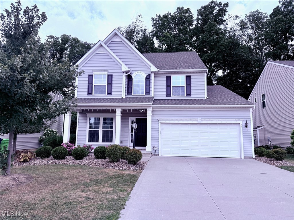 Beautifully maintained home with high ceilings, a cozy gas fireplace, and a bright bonus sunroom. The gourmet kitchen features stainless steel appliances and cherry cabinets. Upstairs offers three spacious bedrooms and a loft, with the master suite boasting a walk-in closet, jetted tub, and walk-in shower. The finished lower level includes a third full bath. Outside, enjoy a well-maintained landscaped yard with a patio and raised garden beds. Schedule a showing today!