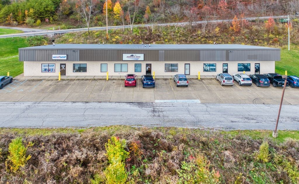Discover a fantastic investment opportunity with this impressive 9,000 square feet commercial building for sale, featuring a spacious parking lot to accommodate your business needs. Currently home to reputable tenants, WeStaffBetter and long-term tenant Mountain River Physical Therapy, this property offers 3,000 square feet of vacancy for your vision. Located in a prime area just off interstate 77 and near South Parkersburg's bustling retail corridor on Pike Street, this building is perfectly positioned for success. Don't miss out on the chance to secure a valuable asset in a thriving location!