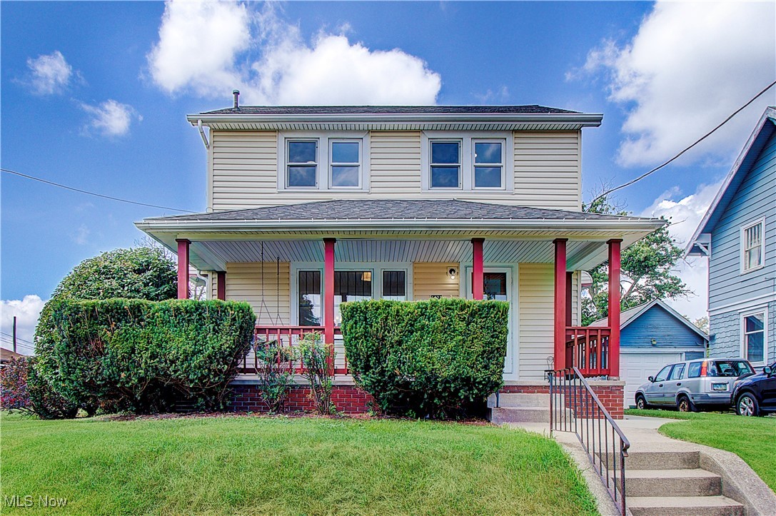 Remodeled Two Story Home with detached three car garage. This home features a lovely front porch with porch swing, Large living room with decorative fireplace, stunning archway into the dining room, which has double glass french doors that walk out to a private deck. Large kitchen with new cabinets, butcher block countertops, new dishwasher, first floor half bath, Three bedrooms on the second floor and large full bathroom. Unfinished attic space for storage. Full Basement, glass block windows. This home has new carpet, paint, lighting and is ready to move in!