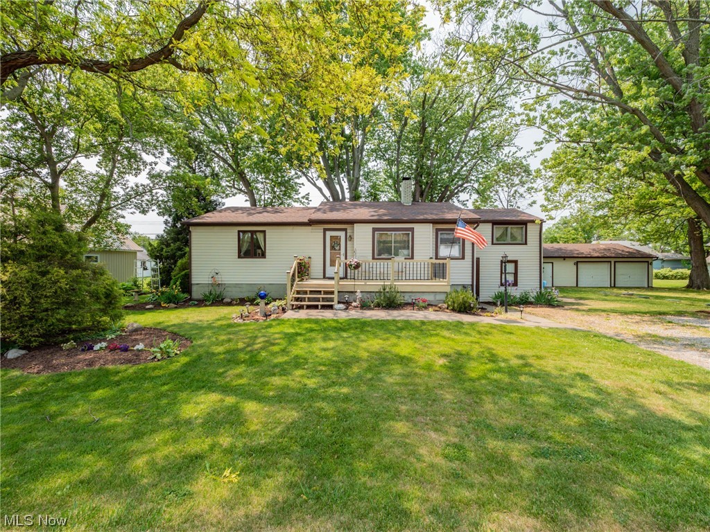 Welcome to this delightful 3-bedroom, 1-bathroom home nestled within the serene and sought-after private Volunteer Bay. Surrounded by the natural beauty of Lake Erie provides an idyllic lifestyle for its lucky residents. Upon arrival, you'll be greeted by the home's charming curb appeal, featuring a well-maintained exterior and a manicured lawn. Step inside, and you'll find a cozy and inviting living space, perfect for relaxation and everyday living. The open layout seamlessly connects the living room to the adjacent dining area, creating a warm and inviting ambiance. The kitchen is efficiently designed and boasts ample cabinet space, making meal preparation a breeze. It offers modern appliances and a functional layout. The three well-appointed bedrooms provide comfortable retreats for family members or guests. The shared bathroom is tastefully designed, featuring a combination shower and tub, a vanity sink, and storage space. Stepping outside, you'll discover the true beauty of this p