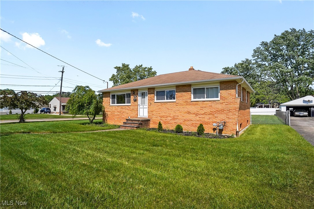 Newly remodeled 3 bedroom brick ranch situated on almost 1/4 acre corner lot. Freshly painted in neutral colors with updated kitchen, bath, and flooring throughout. The large finished basement offers more living space with a huge rec room, spacious laundry room and ample room for storage. Large fenced in backyard with concrete patio are perfect for entertaining or just relaxing on a warm summer night. The 2.5 car garage provides a great place to put those extra outdoor items. The roof and windows we replaced approx. 2009. Ideal location with easy access to the highway, restaurants and shopping. Less than 10 minutes from the airport. You will truly appreciate the low maintenance brick exterior and high efficiency heating and cooling. Hurry! Won't last!