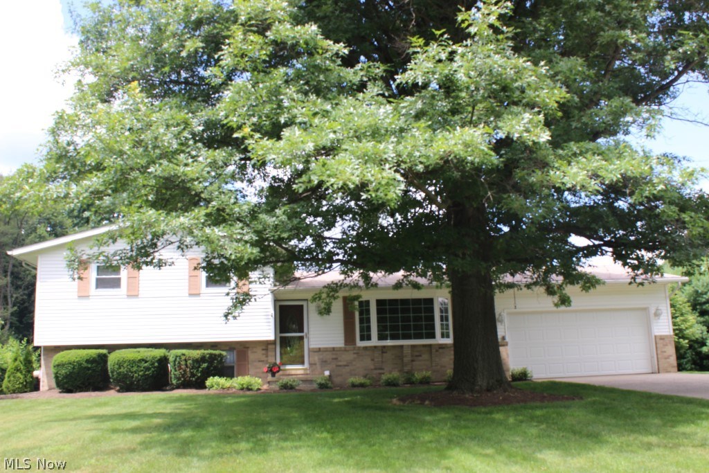 Delightful & pristine one owner 4 level split! Pretty neutral décor, open floor plan & absolute move in condition* Offering 3-4 bedrooms, 1 bath (room for 2nd bath), 1716SF, 17x11 3 season sunroom wrapped w/windows on level 1/2 acre lot* Entry w/beveled glass front door* Spacious living room w/updated bay window* Dining w/French doors to sunroom* Light & bright kitchen w/pass thru to sunroom, ceramic floor, range, refrig, microwave & dishwasher* 17x11 sunroom w/access to wrap around deck & overlooking tranquil back yard* Lovely family room w/stone WB fireplace* 4th bedroom or office* Basement level squeaky clean w/ample storage area & includes washer & dryer* Updates include champion windows (bay plus 6) 2006 w/transferrable lifetime warranty* Portion of basement waterproofed (2014) w/transferrable lifetime warranty* A/C (2003)* H20 (2006)* Shingles (2004)* Vinyl siding (1998)* Invisible fence* Gas budget $53/m0 & electric budget $110/mo* Home warranty provided*