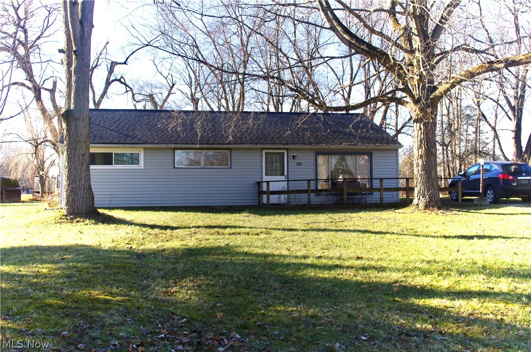 Wonderful opportunity to own at a great price! This ranch, nestled on just over half an acre has endless potential. Step inside and you are greeted with an open and airy feel. This home offers 3 bedrooms, 1 full bath and a sunroom off of the kitchen brings additional space. Outside is a nice size yard and a two car garage. This home has been well loved and with a little TLC, you can have the home of your dreams!