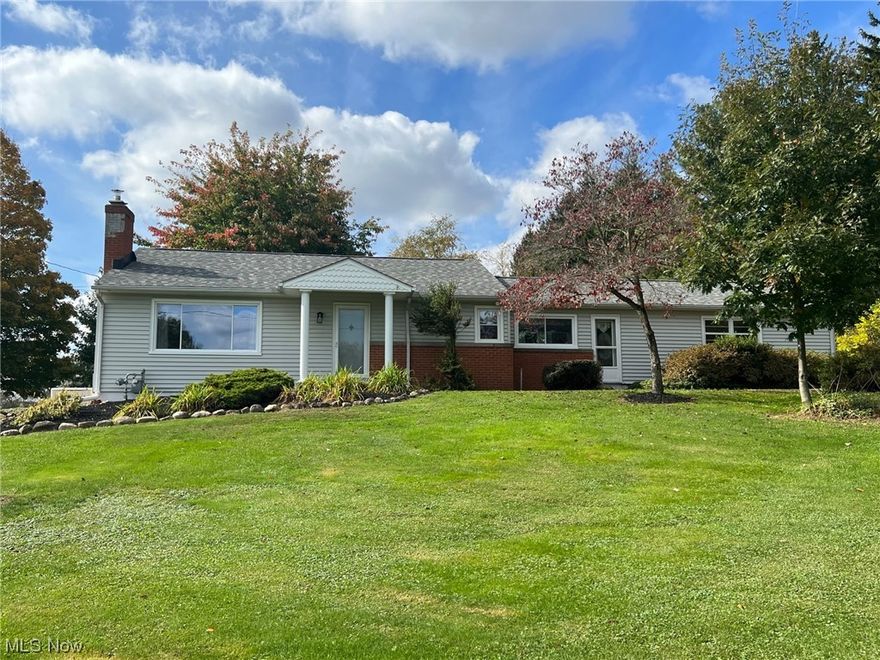 Enjoy One Floor Living in this Beautifully Updated 3 Bedroom & 2 Bath Ranch! Living Room with hardwood floors, stone fireplace with wood burning insert open to Remodeled Kitchen with maple cabinets, breakfast bar, ceramic title floors & all appliances stay. Bright & light tongue & grove Sunroom with sliders to deck & deep park-like backyard. All 3 Bedrooms have hardwood floors and both full bathrooms have been updated. Remodeled 2nd full bath includes wider doorway with wheelchair accessibility. Full waterproofed basement with Rec/Playroom, office/possible 4th bedroom, laundry & storage area. Central air. Whole house generator 2020. Newer HWT. Vinyl siding & windows. New roof installed 2019. 2-car attached garage plus 32x24 outbuilding/garage with covered patio! 1-yr Home Warranty. Chardon Schools.