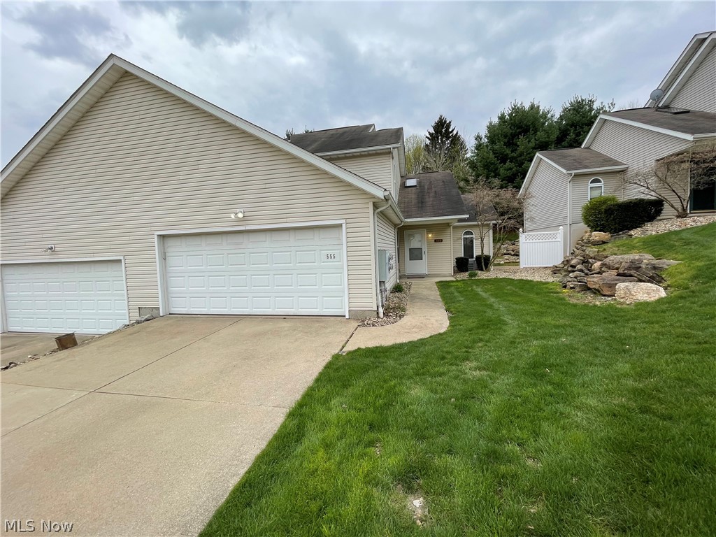 Updated Condo!! First Floor Living with Full Bath on the main floor! 2 more Bedrooms upstairs with Jack and Jill full bath. Vaulted ceilings, Hardwood and Tile floors, 2 car attached garage with keypad. Kitchen appliances and one year home warranty included.