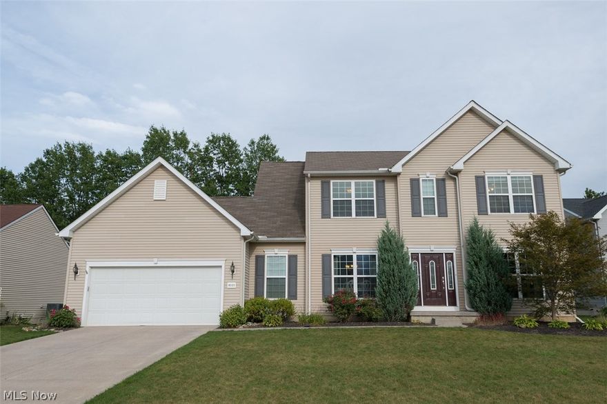 Welcome to Cypress Station in North Ridgeville where access to major highways and everyday amenities are right at your fingertips! There is plenty of room for everyone in this 4 bedroom, 2.5 bathroom Benjamin floorplan that is over 2700 square feet and situated on over a third of an acre. Enjoy the amazing eat-in kitchen with great counterspace, stainless steel appliances and an island perfect for eating and serving. Pass through the kitchen to the oversized morning room with cathedral ceilings, added windows for extra natural light and a sliding glass door that leads to the backyard. The stylish family room has a corner gas fireplace and lots of room for seating. Formal dining room provides a great place for a nice meal and the office/living room is a perfect place for a quiet work area. Nine foot ceilings add an airy feel to the first floor. Solid maple floors flow through the foyer, formal dining room, hallway, kitchen and morning room giving an elegant look with easy maintenance. F