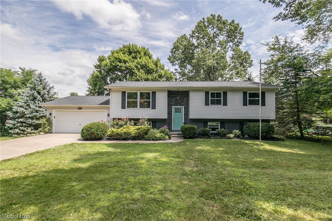 This stunning bi-level is ready for you to move in today!! Located in Stow, this completely renovated home has all the modern touches; subway title in the kitchen, farm house light fixtures, new flooring throughout, and you can't miss the ship lap wall in the bathroom! All new granite counter tops, white shaker cabinets, stainless steel appliances and check out that charming vanity in the upstairs bathroom. Downstairs there is large rec room, home office/craft room, and full bathroom. Walk out of your rec room to a delightful patio to your beautiful yard. Do not forget the shed to keep all your yard and garden supplies in! Other updates include: new roof, windows, front door, and furnace. Call today for your showing before it's gone!