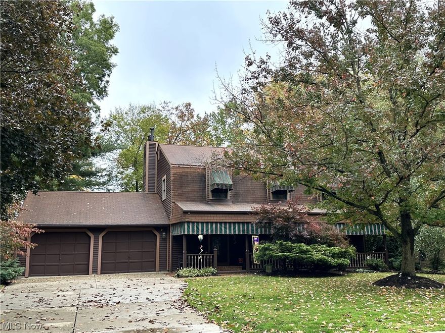 WOW, what a great buy! As soon as you walk on the porch & enter the foyers you will notice the comfortable feel you get. The spacious living room flows thru to the formal dining room. The well-appointed kitchen offers plenty of cabinet space & the unique back splash. The main level also features a family room with a gas fireplace (was woodburning) with a slider to access your private backyard retreat. You can sit on your deck and watch the wildlife. Upstairs you will find the master bedroom & bath with double closets.  All 4 bedrooms & baths are good size with plenty of closet space. The basement has a laundry area, storage area & workshop area with work bench.  This house can easily be your forever home! When spring comes you will notice the beauty of your lilacs, dogwood, weeping cherry, & magnolia bush.