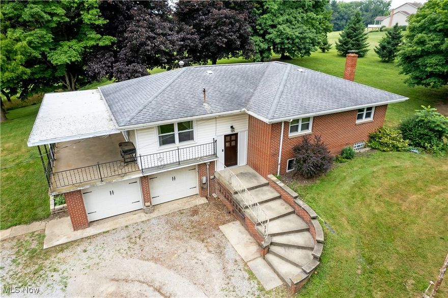 Great price and affordable!! Enjoy the sunrise & sunset on your brand new deck overlooking valley views! This Mohican property sits on 4.64 Acres w/open land to fence for 4-H animals & paths through the property. Many remodels inside this 3 bedroom, 2.5 bath home. The lower level offers a new 4th bedroom or office, game area & family room.  Plenty of storage. Brand new central air, remodeled kitchen w/ pantry.  2 car attached heated garage, 3 car detached storage building. 28x20 barn with water and electric.  Budget friendly utilities and so much more.  Home Happens Here! Call today for a private tour.