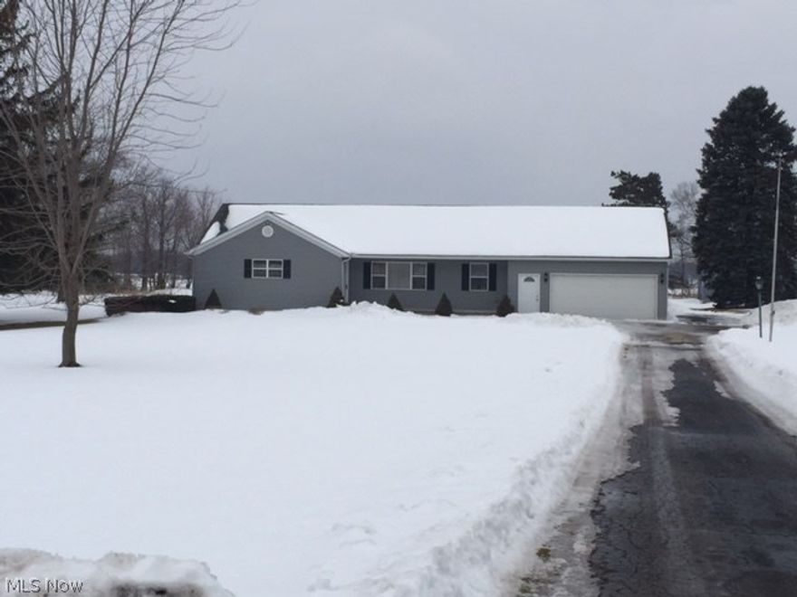 Fantastic ranch home built in 2005 sits on over 3 acres...beautiful view overlooking farm land. There are 3 bedrooms and very open floor plan. Great room opens into dining area and kitchen off the dinette there is a covered porch. Enjoy a country setting while taking in beautiful sun sets. Very neutral decor. Move in ready. There is a 20x40 detached garage as well. Perfect for toys. It has a Phase 3 220 line.