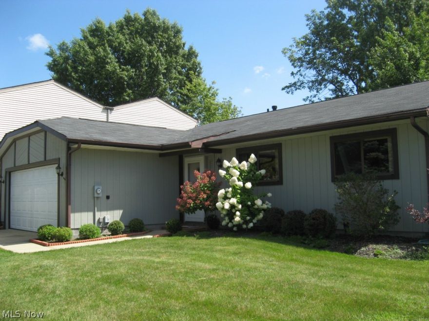 Sharp ranch design with functional 3 bedroom, 2 bath layout. Generous sized living room with newer picture window and fireplace with newer gas logs. Dining room is open to the living room with sliders accessing a private patio. Eat-in kitchen with newer awning window, nice laminate floor and newer appliances. Laundry area includes a washer & dryer and the newer laminate floor continues into the front entry area. Freshly painted interior and available for immediate occupancy! Landscape beds in the private patio area and the rear yard, limited common area offer a nice compromise for someone looking to downsize from a single family home yet desires the ability to control a manageable amount of landscaping. The patio area features privacy fencing, paver stones, retention walls defining the landscape beds and a gate access to the rear common area. A unique, covered patio/storage area offers valuable bonus space. Two car, attached garage with newer overhead door and automatic opener. Ample,