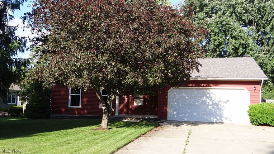 Great home in Tallmadge Highlands. Roof and siding 2009. A tiered deck overlooks a fully fenced in yard and an outbuilding for additional storage. Gas fireplace in the family room. 2010 double oven. A large 97 gallon hot water tank