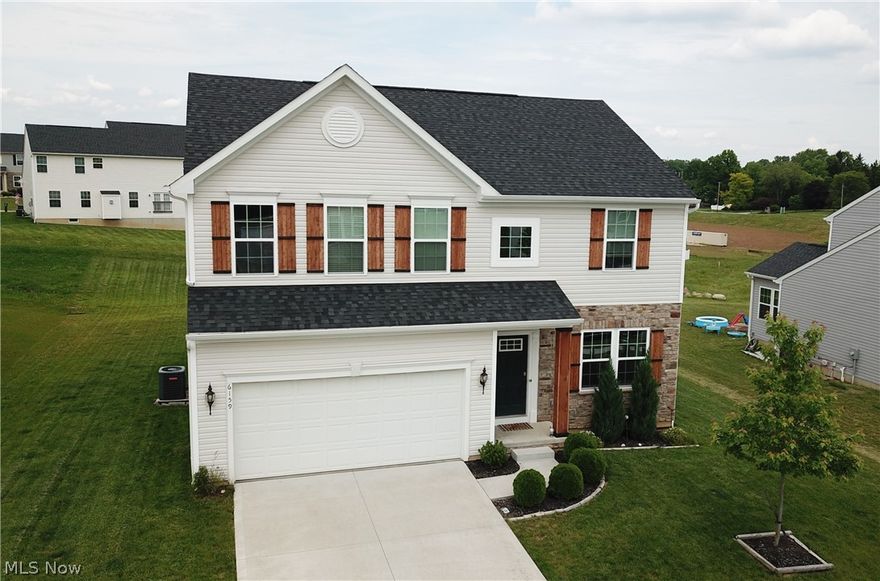 Welcome to 6159 Llainfair St. SW, a 4-bedroom, 3-bathroom home in Massillon! Step inside the front door to find a seating area -- perfect to use as a formal living room, an office, playroom...whatever you desire! Next you’ll find a large, open-concept family room, kitchen, and dining area. Beautiful luxury vinyl flooring throughout main level. The kitchen has gorgeous black cabinets and stainless steel appliances. Convenient half bath located on main level. Head upstairs to find the large master’s suite, complete with a huge walk-in closet and spacious bathroom with a soaking tub. Three additional bedrooms and a full bathroom located on second level. The spacious basement has potential to be finished. Backyard has a patio offering a great spot to entertain. Don’t miss your chance to own this lovely home!