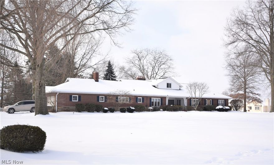 Welcome to 640 Austin Avenue! This 4-bedroom, 3.5-bathroom home with an incredible 3,568 square feet is located in Barberton; the builder built the home for his daughter as a wedding gift. The main floor sits on concrete. In addition to the living room, eat-in kitchen, and dining room, this home has an office with impressive built-in cabinets and shelves. Teak wood throughout home. Huge, convenient laundry room located on the main level. There are three bedrooms and 2.5 bathrooms located on the main floor as well. Upstairs, there’s a fourth bedroom and full bathroom. The basement is extremely spacious and provides a ton of extra space, whether you need it for storage, entertaining, a gym, etc. A sunroom is located on the back of the house, with access to the back porch. See attached list of recent updates. You do not want to miss your chance on owning this stunning home; schedule a private showing today!