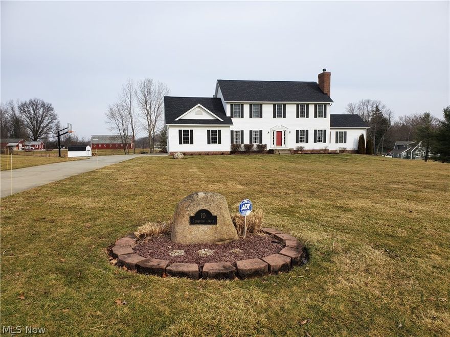 Welcome to this beautiful, over 3200 square foot, 4 bedroom, 3 1/2 bath home sitting on 2.47 acres of property with a  view of Pine Lake from the backyard.  This home features, 2 master bedroom suites, 1 on the first floor with master bath and jacuzzi tub and 1 on the second floor with master bath, both with large walk in closets.  Living room with fireplace, Great room, Dining room and large eat in kitchen with all appliances.  Hardwood floors throughout (2019). Sit in the all season room and walk out to a large pebble stone patio featuring a natural line gas grill.  First floor laundry, full finished basement with workout room, lots of storage and 2 1/2 car garage with 2 year old garage doors and opener.  Other updates include new kitchen countertops, 1/2 bath countertop, new lighting in kitchen and front room, some new paint. There is a gravity drain and generator.  So many more features to see.  Schedule your showing today!