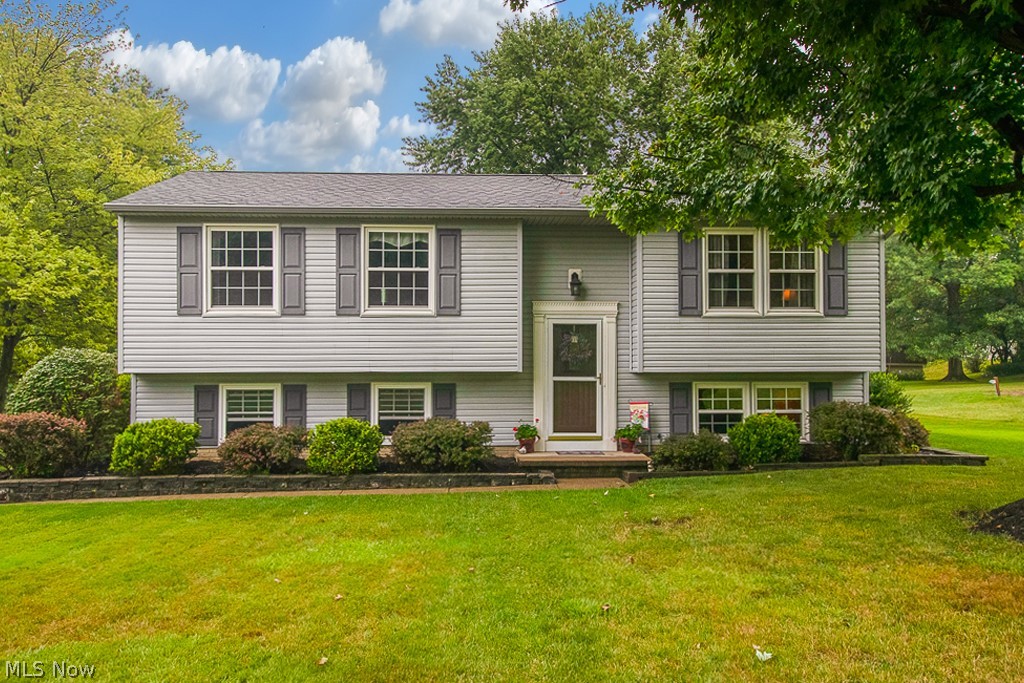 Talk about amazing location! This incredibly well maintained home sits conveniently between I-71 and I-77 in Medina Township to make commuting to the Cleveland or Akron area a breeze! Just at the end of the street, you'll be able to enjoy the beautiful new Mugrage Park. You'll instantly see pride in home ownership as you walk in the front door. When you walk upstairs, you'll be wowed by a custom farmhouse kitchen, one of a kind granite countertops, and an impressive amount of cabinet space! This kitchen is a true wine lovers dream with custom wine racks and wine fridge built in. You'll notice the gorgeous back deck where you can easily entertain or sit and enjoy your morning coffee under the pergola. The three bedrooms upstairs are accompanied by a full bath and a spacious living room. When you go downstairs, you'll notice the beautifully updated laundry room and access to the two car garage. The warm and cozy finished family room and updated half bathroom will make you feel right at h