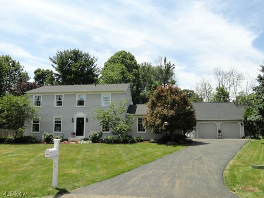 Beautiful park-like backyard with partial fenced-in area and gardens, located at the end of a quiet cul-de-sac.  The home has been nicely updated with granite in Kitchen, new hardwood flooring, newer roof, central air conditioning and more!  Two car attached and a three car detached Garage.  Better hurry on this one!