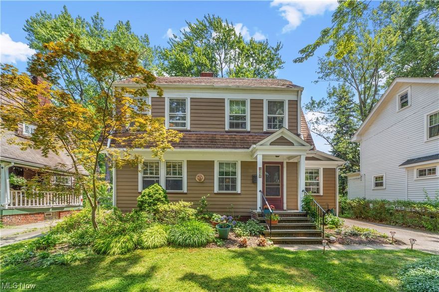 Nestled on a quaint, tree-lined street in a beautiful Cleveland Heights neighborhood, this home seamlessly blends character and convenience with quality. Stepping through the entrance you are immediately greeted with hardwood floors throughout the first level, creating an inviting and comfortable atmosphere. The first level boasts a large living room with wood-burning fireplace, a dining room with built-in china cabinet, a half bath, and wood-paneled office, complete with a private entrance. The recently updated kitchen opens out to the deck and backyard.  Upstairs you'll find three bedrooms and a full bathroom. Out back on the deck you overlook a deep, fenced-in and shaded backyard, with large perennial beds.  Kitchen and all appliances recently updated. Electrical recently updated. Recently installed water heater. Meticulously cared for for nearly 30 years. Conveniently located to beautiful parks and recreation, swimming pools, and University Circle with its world class arts and inst